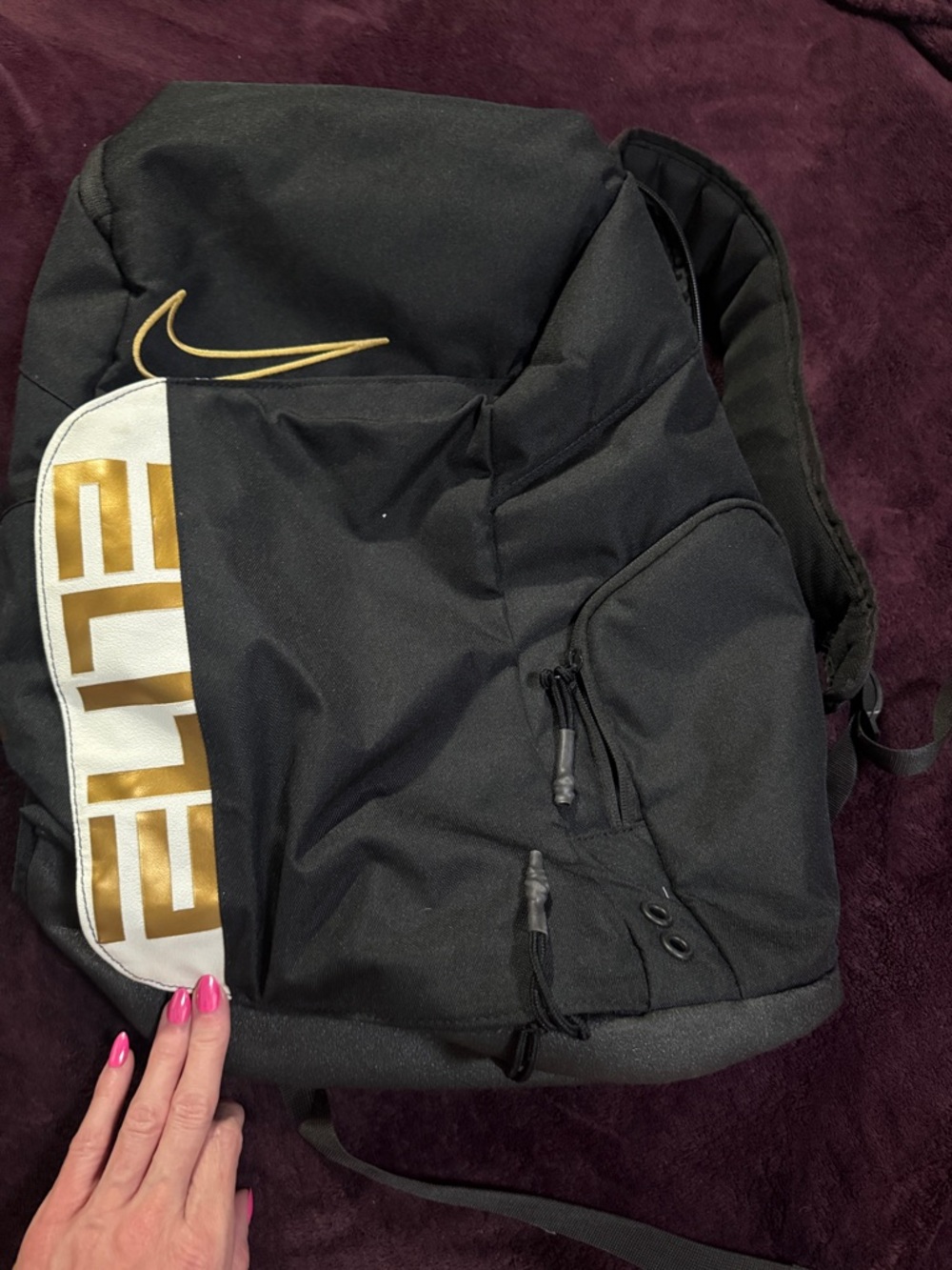 Nike Black Backpack with Gold Logo and Accents